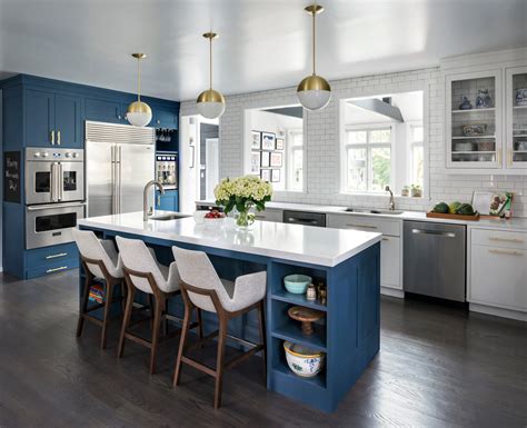 navy blue island with white cabinets